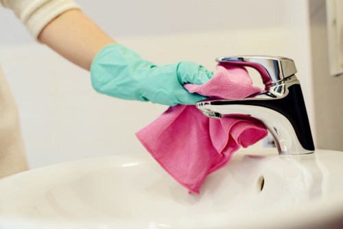 Office cleaners working in a Chiswick workplace reception area